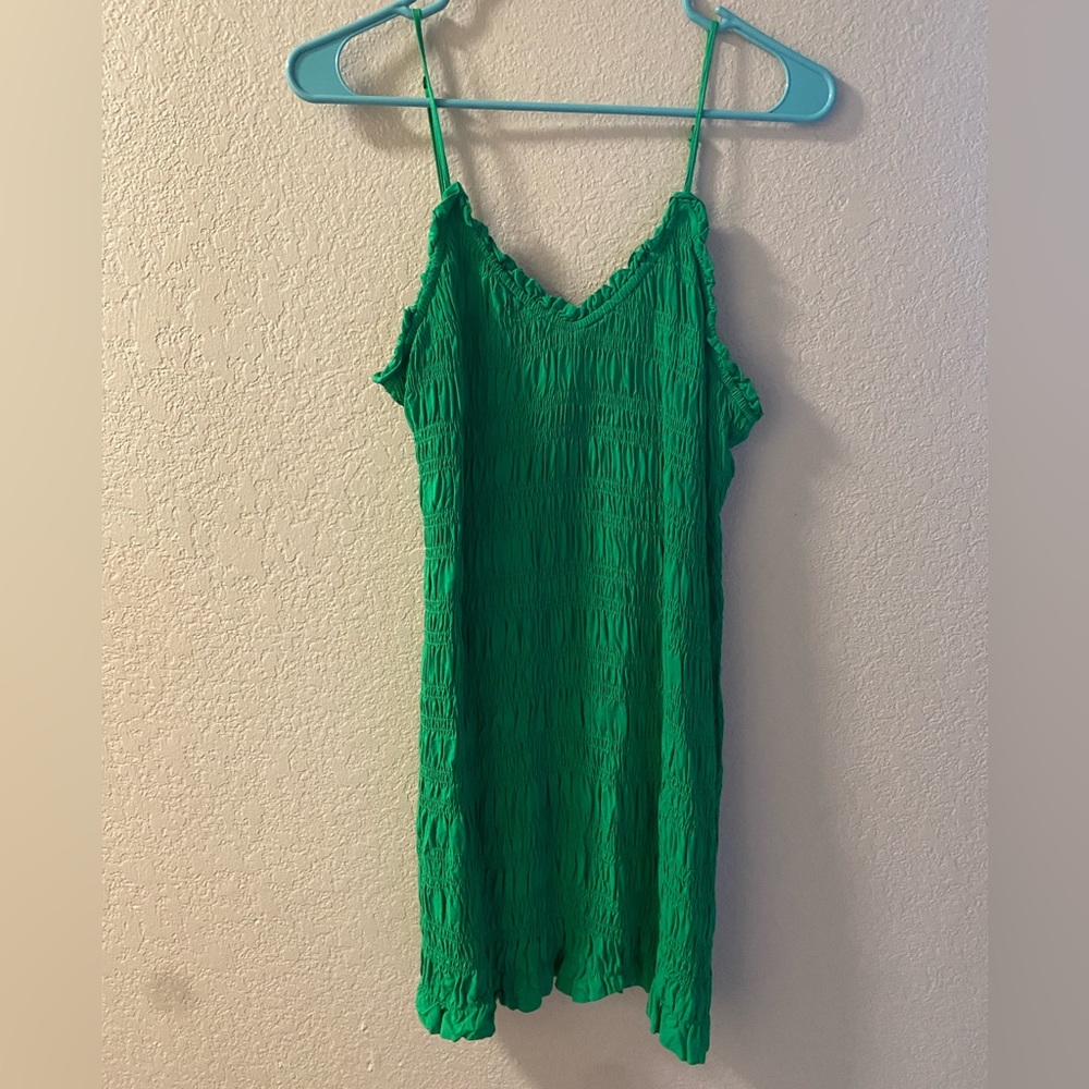 Green ruched mini dress